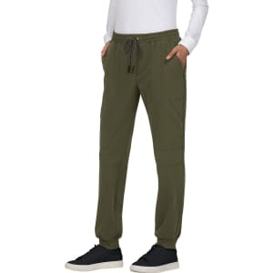 A pair of olive green jogger pants with pockets and a drawstring waist, featuring a logo on the side.