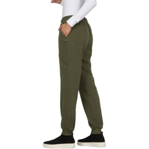 A pair of olive green jogger pants with side pockets, featuring a relaxed fit and elastic waistband.