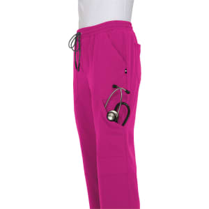 A pair of vibrant pink jogger pants features a pocket with a stethoscope. The pants have an elastic waistband and drawstring.