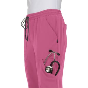 A pair of pink jogger pants with pockets, featuring a stethoscope tucked into one of the side pockets.
