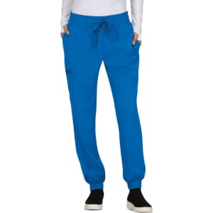 A pair of blue jogger pants with pockets and a waistband drawstring, featuring a logo on the side.