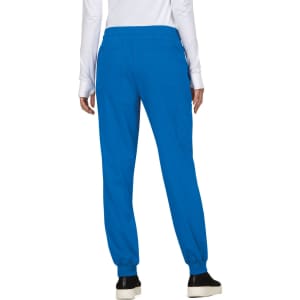 A pair of bright blue jogger pants with an elastic waistband and pockets, viewed from the back.