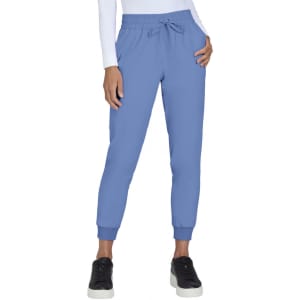 Jogger pants in light blue, featuring an elastic waistband and ankle cuffs, paired with a slim-fit silhouette.