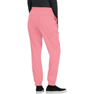 A pair of pink jogger pants with side pockets, featuring an elastic waistband and tapered legs.