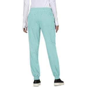 A pair of light blue jogger pants features a waistband and pockets, with a model shown from the back.