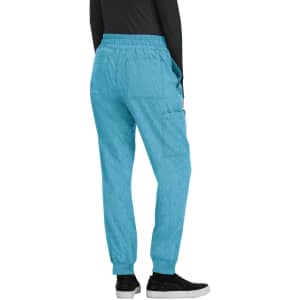 A pair of turquoise jogger pants with a relaxed fit and side pockets, featuring an elastic waistband.