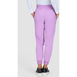 A pair of lilac jogger pants with an elastic waistband and side pockets, worn from the back.
