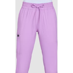 A pair of pastel purple jogger pants with an elastic waist and a side pocket, featuring a branding logo.