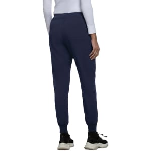 A pair of navy jogger pants with a tapered fit and elastic ankle cuffs, featuring rear pockets.