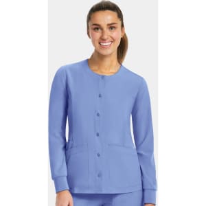 A women's round neck snap jacket in a light blue colour, featuring long sleeves and front pockets.