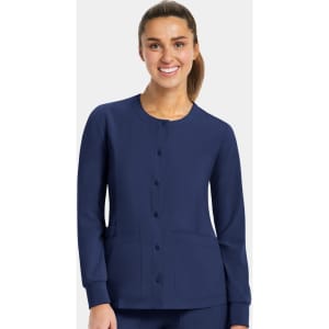 A women's round neck snap jacket in navy blue with long sleeves and front pockets, featuring a logo.