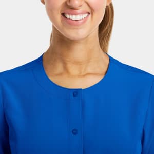 A round neck snap jacket in vibrant blue, featuring a front button closure and a smooth fabric finish.