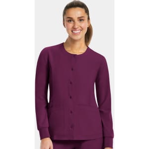 A round neck snap jacket in a rich purple colour featuring long sleeves and front pockets, with a logo.