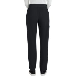 A pair of black boot cut pants viewed from the back, featuring an elastic waistband and side pockets.