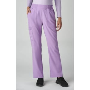 A pair of lavender boot cut pants features pockets and a fitted waistband, worn by a person in a white long-sleeve top.