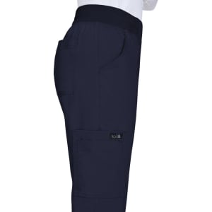 A pair of navy pants featuring a stretchy waistband and side pockets, with a logo on the side.