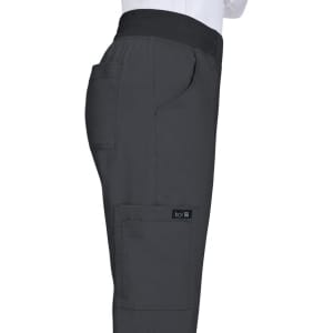 A pair of dark grey pants with a side pocket and a branding label on the leg.