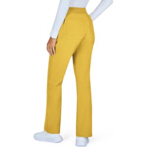 A pair of yellow pants with a flared design, featuring back pockets, displayed on a model wearing a white top.