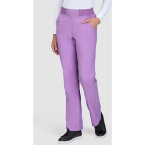 A pair of lilac pants with a slim fit and pockets, featured on a model. The pants have a logo on the waistband.