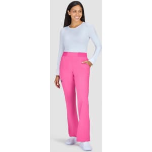 A pair of bright pink pants with a relaxed fit, styled with a light blue long-sleeve top.