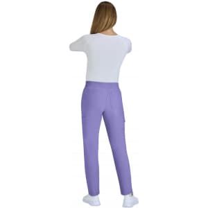 A pair of limited edition purple Harper pants displayed from the back, complemented by a white top.