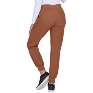 A pair of brown jogger pants with elastic cuffs and pockets, featuring a person wearing them from the back.