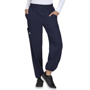 Navy blue cargo pants with elastic cuffs and side pockets, worn by a model. Features a logo on the garment.