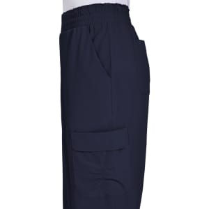 Ayla Pant in navy, featuring an elastic waistband and side pockets. The design includes a cargo pocket on the leg.