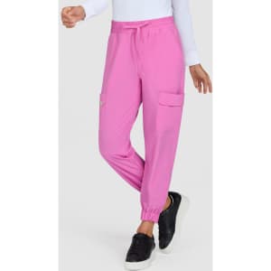 A pair of pink jogger pants with elastic cuffs and side pockets, featuring a comfortable, casual style.