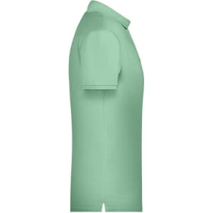A green men's basic polo shirt with a classic collar, short sleeves, and a small logo on the chest.