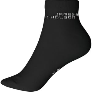 A pair of black organic sneaker socks with a branding logo on the side.