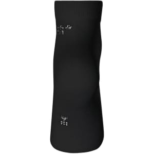 A pair of black organic sneaker socks with a ribbed cuff and a logo.