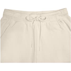 A pair of cream-coloured ladies lounge pants featuring an elastic waistband with a drawstring and side pockets.