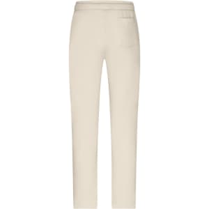 Light beige lounge pants with a simple design and a back pocket, featuring a logo on the waistband.