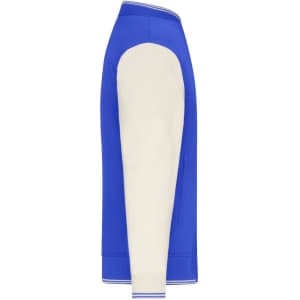 A varsity jacket featuring a blue body and cream sleeves with a ribbed collar and waistband. It has a logo on it.
