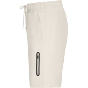 Men's interlock sports shorts in light beige, featuring a zipped pocket and an elastic waistband.