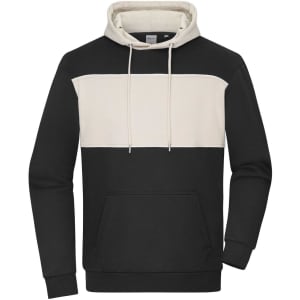 A colour-block hoodie featuring a black lower section and a cream upper panel, with a front pocket and drawstring hood.
