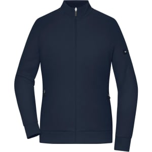 A navy interlock zip jacket featuring a stand collar and side pockets, with a logo on the sleeve.