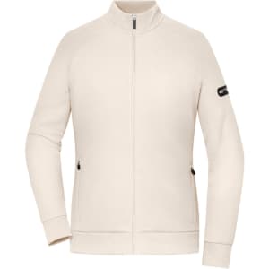 A cream-coloured zip jacket with side pockets and a logo on the sleeve.