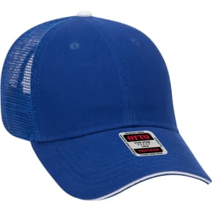 A blue 6 panel trucker hat with a mesh back and a branded tag on the front.