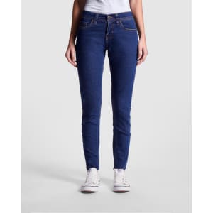 A pair of women's denim jeans in dark blue with a slim fit design, featuring a branding logo.