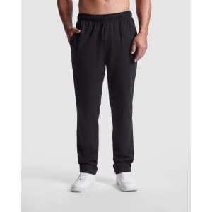 Black track pants with an elastic waist and side pockets, featuring a logo on the waistband.