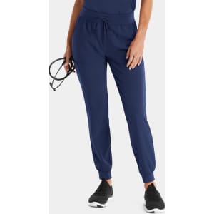 A pair of navy joggers with a fitted cuff, featuring an elastic waistband and pockets. There is a logo visible.