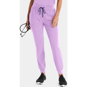 A pair of women's jogger pants in a light purple colour, featuring an elastic waistband and cuffs.