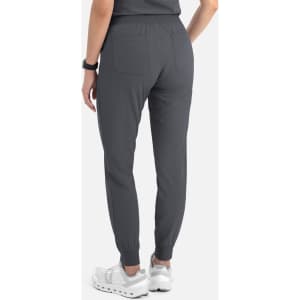A pair of dark grey women's joggers with a tapered fit and cuffed ankles, featuring back pockets.