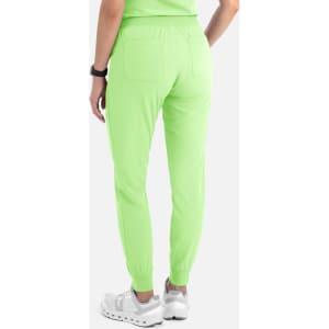 A pair of women's joggers in bright lime green with a tapered style and elastic cuffs at the ankles.