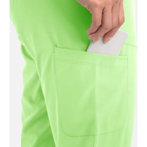 A pair of bright green joggers featuring a back pocket with a hand placing a phone inside.