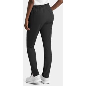 Black women's skinny pull-on pants from the back, featuring a stretchy waistband and logos.