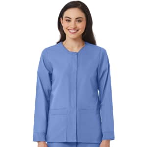 A warm-up jacket in a light blue colour, featuring a button-up front and two front pockets, worn by a smiling model.