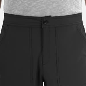 A close-up of black men's cargo pants with a half elastic waistband, featuring a button and pockets.
